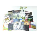 A collection of golf related items including programmes,