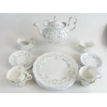 A collection of Royal Albert tea ware in the Caroline design including teaset set and dinner plates