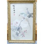 Chinese silk embroided picture of a bird on branch and foliage in gilt frame,