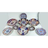 A collection of 19th century Japanese Imari plates in various sizes,