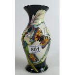 Moorcorft vase decorated with butterflies and foliage,