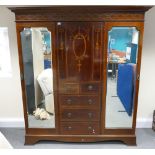 Edwardian marquetry inlaid triple combination wardrobe,