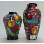 Two Moorcroft vases 2004 (red dot) 20cm and 15cm high in good condition.