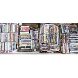 A large collection of DVD's with differing themes - action comedy etc. Four trays.