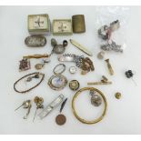 An assortment of silver and other jewellery, vestas, lighter, seals, badges, thimbles etc.