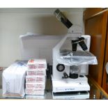 Cycam BMS 76010 SC compound microscope, a selection of Jorvet J-335S microscope slides,