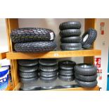 A selection of tyres to include 19 x small cold tube tyres with two Mitres soft racing tyres.