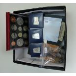 A selection of coins including a 2005 proof set,