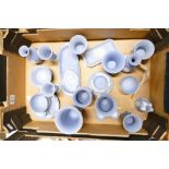 A collection of Wedgwood blue jasperware items to include vases, urns, oval pin trays,