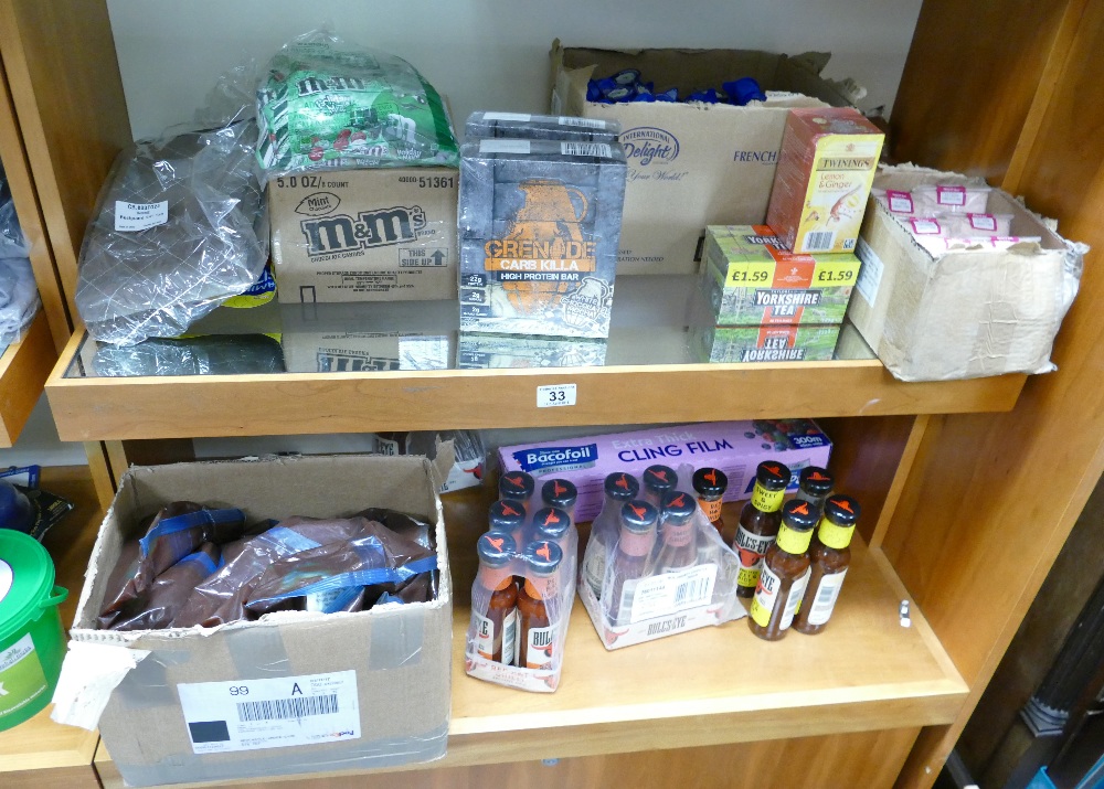 A selection of culinary items and snacks to include Himalayan salt, sugar, teabags, protein bars,