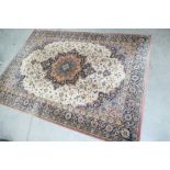 A 100% pure wool rug with stylised design in cream, reds and blues.