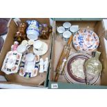 A mixed collection of ceramic items to include decorative water jugs,