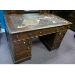 Victorian writing desk on 3 drawer pedestals and triple drawer top with red leather panel (in need