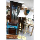 Mahogany glazed corner unit with a pair of mid century chrome satndard lamps and a Black and Decker