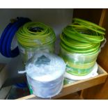 A selection of cables/tubing to including 2 rolls of electric cable,