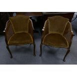 A pair of bergere arm chairs with upholstered back on Queen Anne legs (2)