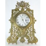 Ornate brass picture frame mantle clock with French balance movement,