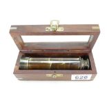 A W Ottway brass telescope in a glazed wooden case