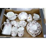 A quantity of Minton teaware in the Ancestral pattern including teapot, coffee pot, cream jug,