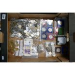 A large quantity of English and Foreign coins including crowns, a quantity of fifty pence coins,