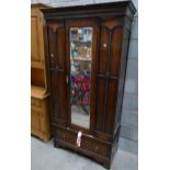 20th Century dark oak wardrobe with a mirrored single door,