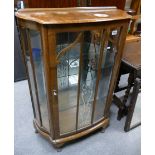 1930's walnut demi-loom single door display cabinet with two glass shelves (with key)