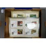 A collection of Royal Mail first day cover stamps all mounted and in gold frames,