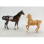 Beswick Palomino Prancing Arab 1261 and Swish Tail brown horse 203. (2).