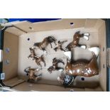A collection of brown Beswick horses and foals to include - 818 Shire, Arab foal 407,