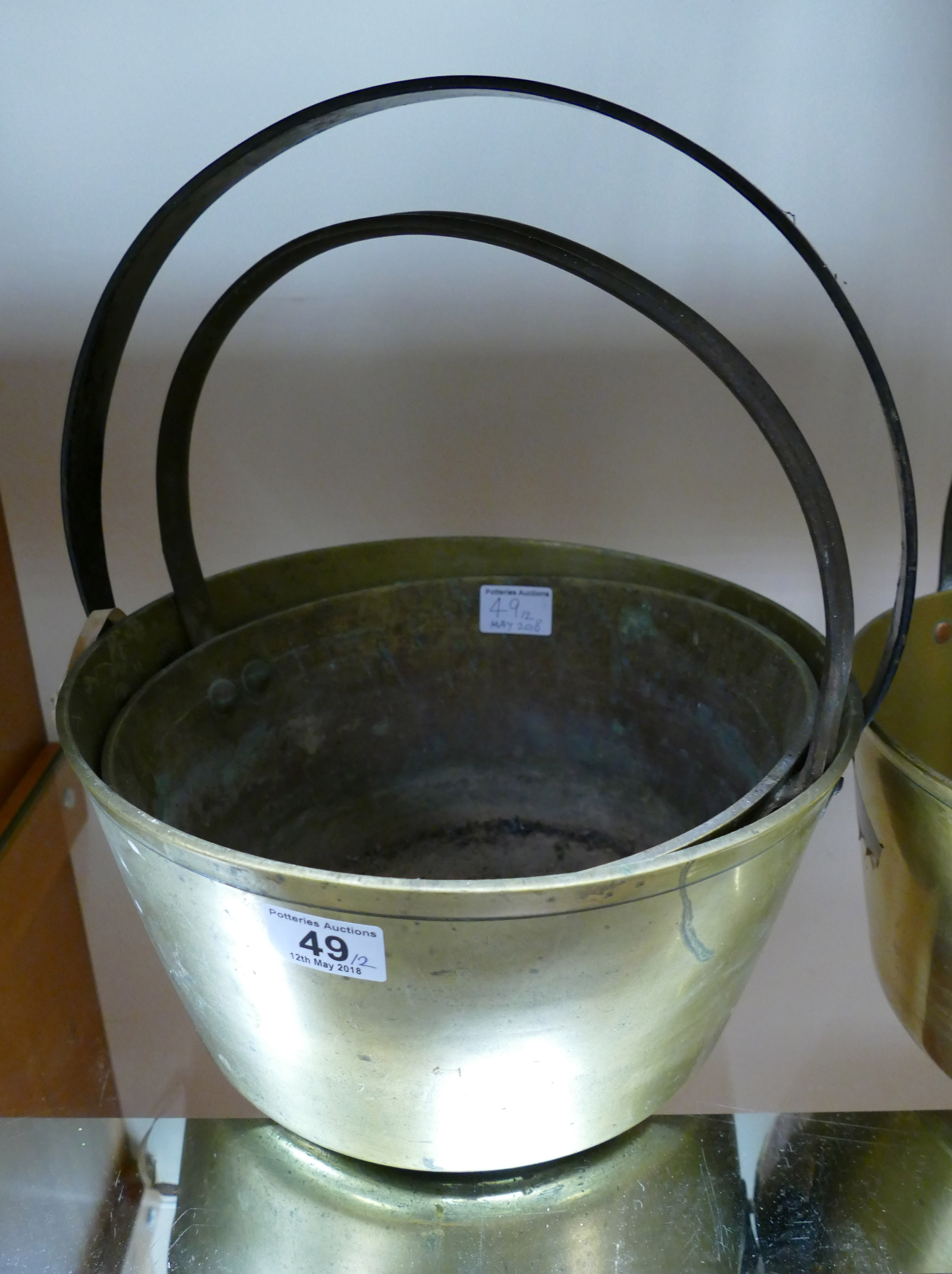 Two brass jam pans