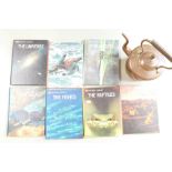 A good 19th century copper kettle in good condition, plus seven nature library books.