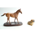 Royal Doulton model of a seated Peckinese HN1040 and Royal Doulton model of a matte horse on wood