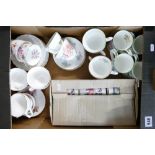 A collection of bone china cups & saucers and mugs.