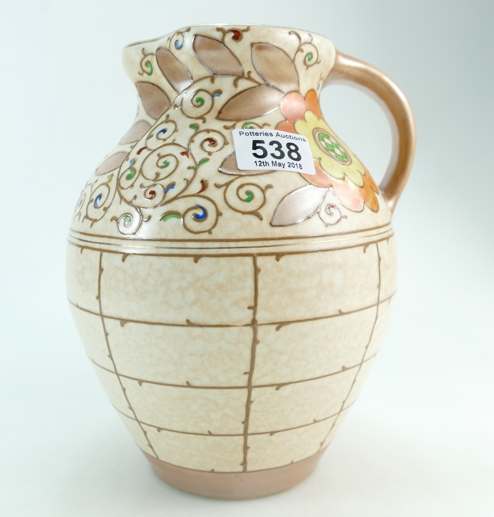 A Bursley Ware Charlotte Rhead jug with embossed border