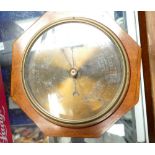 brass faced round mahogany wall barometer mounted on octagonal mahogany inlaid plaque