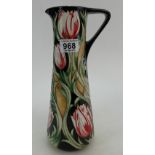 A Moorcroft large jug in the Race against time tulip design by Paul Hilditch. Limited edition 26/40.