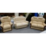 Two seater leatherette sofa with walnut and mahogany accents,