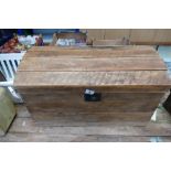 Round topped pine travel trunk complete with early toys and leather type camel figures