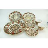 A collection of Royal Crown Derby in the Imari design comprising dinner plates wavy edged plates,