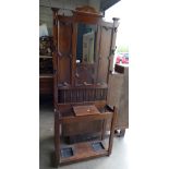 Edwardian panelled Oak hallstand with central mirror.