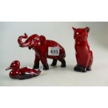 A collection of Royal Doulton Flambe Containing a small elephant,