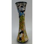 A Moorcroft tall vase in the giant panda design.