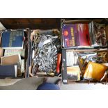 A large collection of mixed items including cutlery sets, Army related magazines, dictionaries etc.