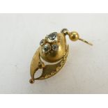 Victorian Yellow metal pendant set with four stones 1.