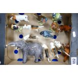 A collection of Beswick items including Elephant, fox hounds, foxes, birds etc (damages to 4 dogs,