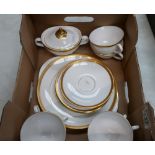 Royal Doulton Royal Gold part teaset comprising six cups , four saucers, covered sugar bowl and lid,