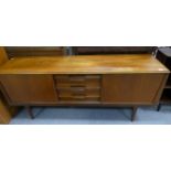 Teak G-Plan sideboard with sliding doors and a three drawer centre