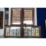 A collection of Danbury Mint framed cigarette cards with themes of soldiers and birds, (4).