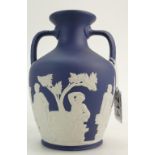 Wedgwood dark blue jasperware Portland vase dated 1974, height 15.