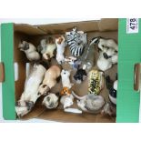 A mixed collection of items to include Beswick and Royal Doulton cats and dogs,